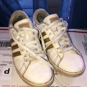 Women’s size 8 gold striped Adidas cloudfoam